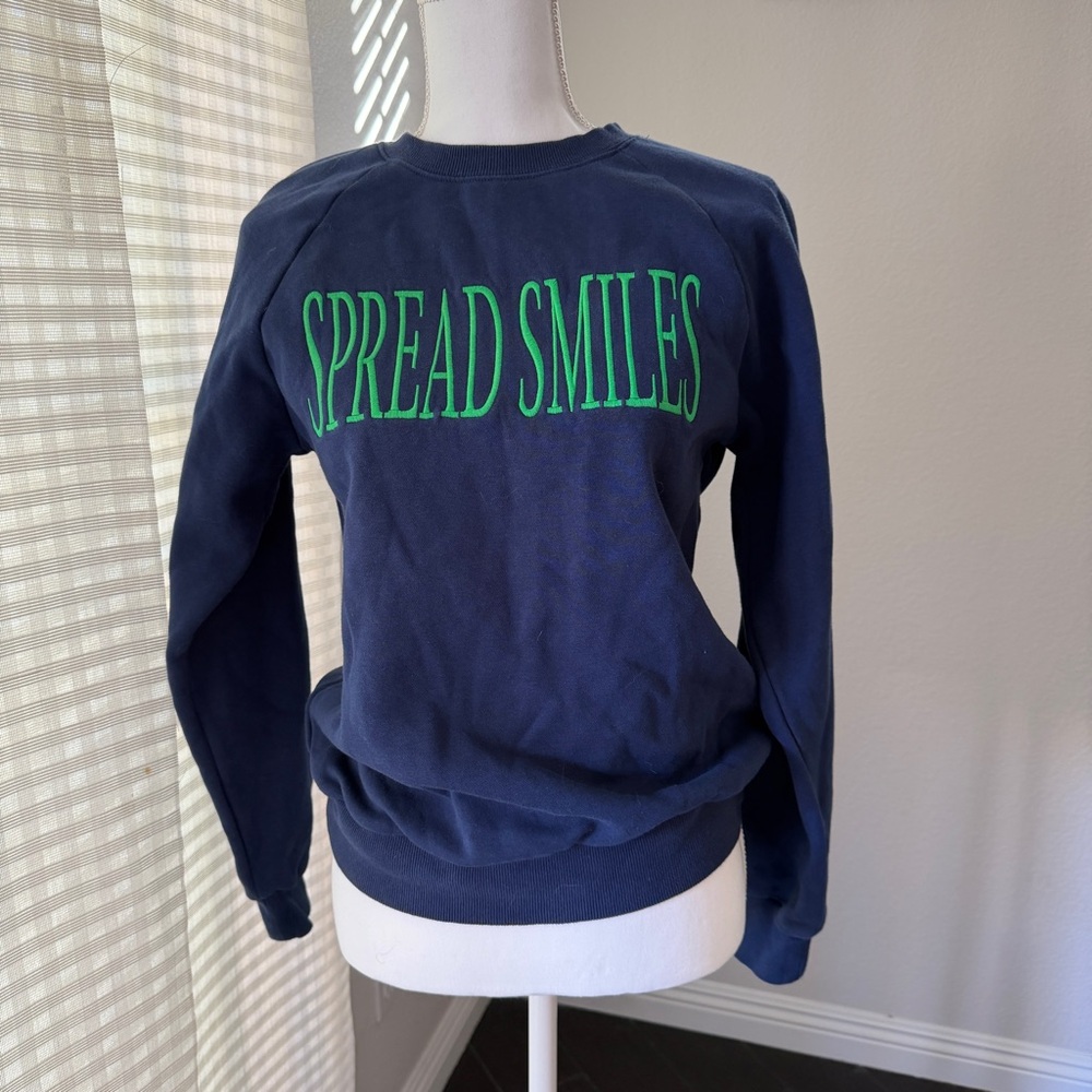 Navy Sweatshirt with embroidered Green Text. Size XS